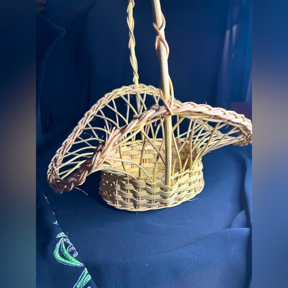 VTG Curved Wicker Basket, some light damage. Made in Hong Kong.